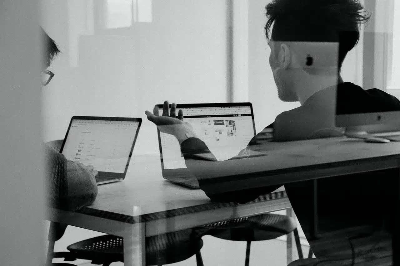 Business owner using a laptop to improve local SEO and online visibility for a company in Mesquite, Texas.