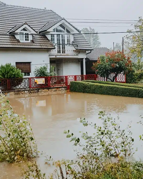 Suburban home flood damage showing emergency restoration company SEO relevance in Dallas Fort Worth